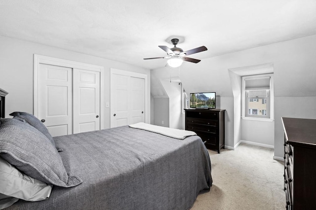 119 Wellman Ave Unit 119, Chelmsford, MA 01863 - bedroom featuring light colored carpet, ceiling fan, baseboards, and multiple closets