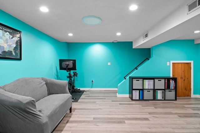 119 Wellman Ave Unit 119, Chelmsford, MA 01863 - living room featuring wood finished floors, recessed lighting, and baseboards