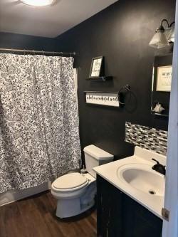 full bathroom with vanity, toilet, wood finished floors, and a shower with shower curtain