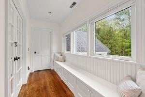 corridor with dark wood finished floors