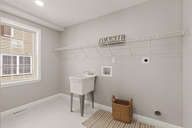 washroom with baseboards, laundry area, electric dryer hookup, and hookup for a washing machine