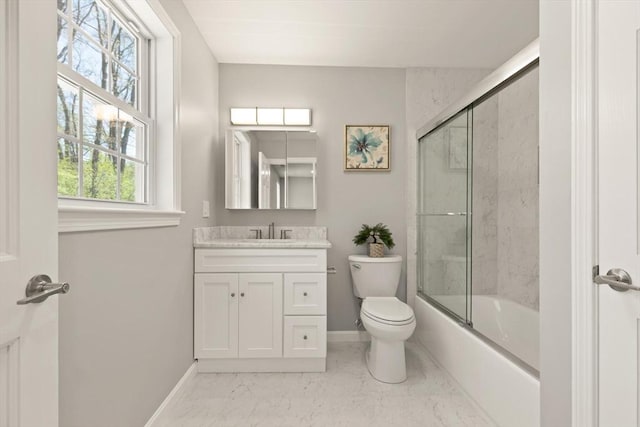 bathroom with baseboards, marble finish floor, toilet, and vanity