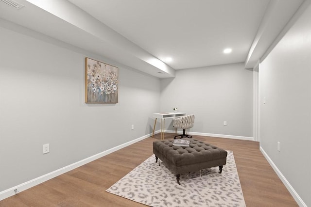 sitting room featuring recessed lighting, baseboards, visible vents, and wood finished floors