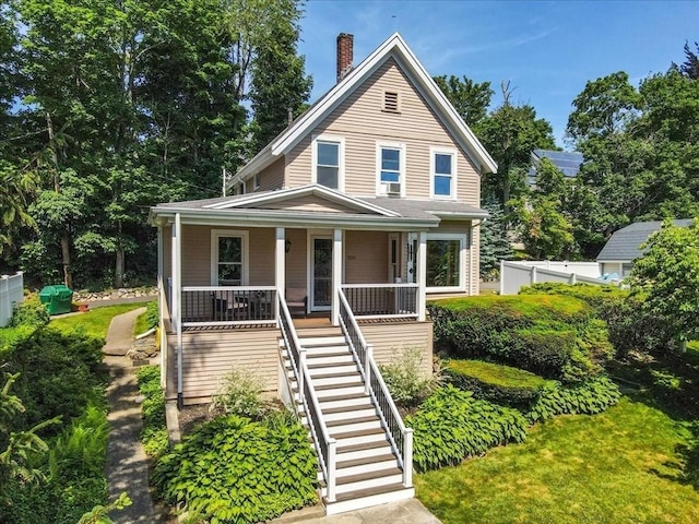 100 Williams Ave, Boston, MA 02136 - view of front facade with stairway, a porch, and a chimney