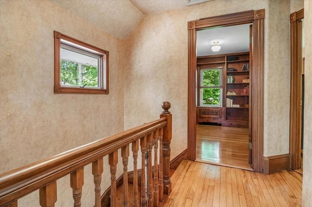 100 Williams Ave, Boston, MA 02136 - corridor featuring light wood-type flooring, plenty of natural light, an upstairs landing, and vaulted ceiling