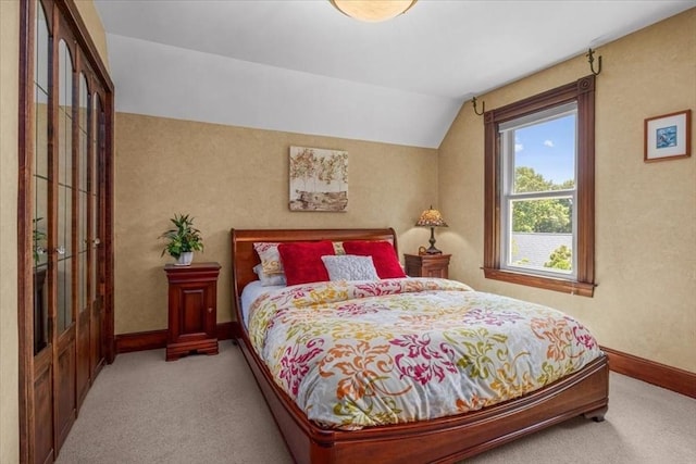 100 Williams Ave, Boston, MA 02136 - carpeted bedroom with baseboards and vaulted ceiling