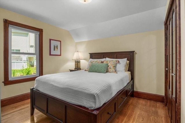 100 Williams Ave, Boston, MA 02136 - bedroom with light wood-style flooring and lofted ceiling