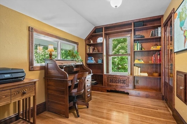 100 Williams Ave, Boston, MA 02136 - sitting room with light wood-type flooring, vaulted ceiling, plenty of natural light, and a desk