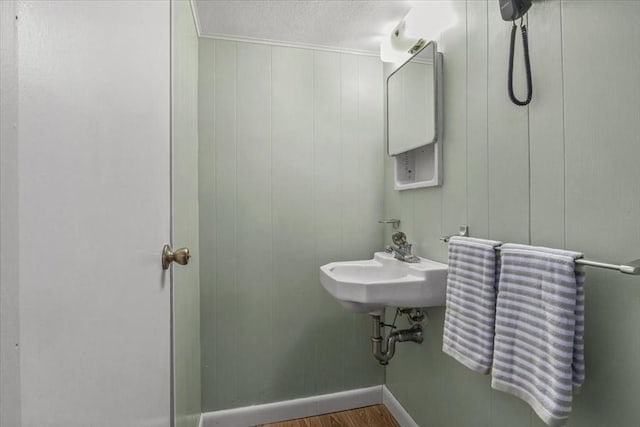 100 Williams Ave, Boston, MA 02136 - bathroom featuring a textured ceiling and wood finished floors