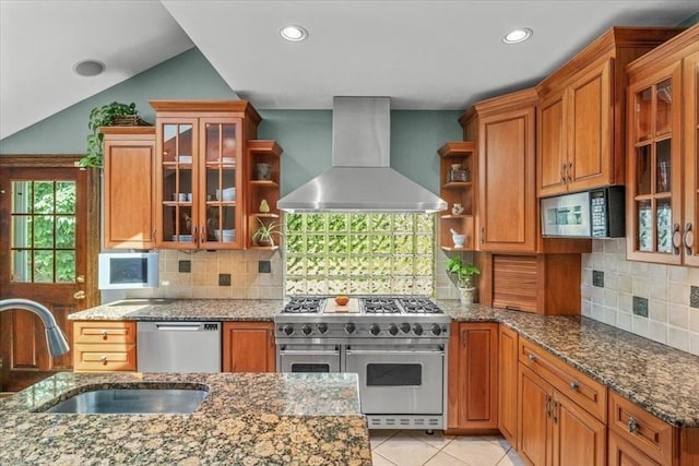100 Williams Ave, Boston, MA 02136 - kitchen featuring wall chimney range hood, stainless steel appliances, brown cabinetry, open shelves, and recessed lighting