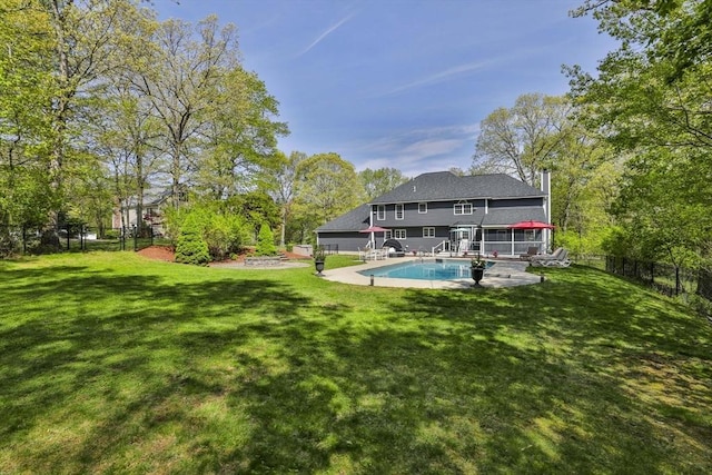 back of property with stairway, a patio, and a deck