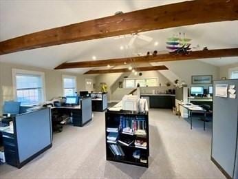 carpeted living room with lofted ceiling with beams and ceiling fan