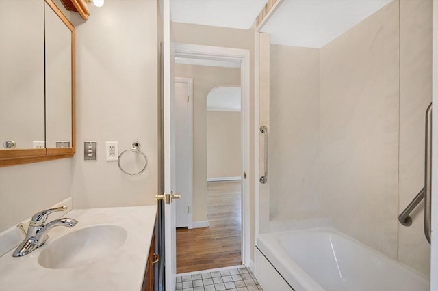 full bathroom with vanity and bathtub / shower combination