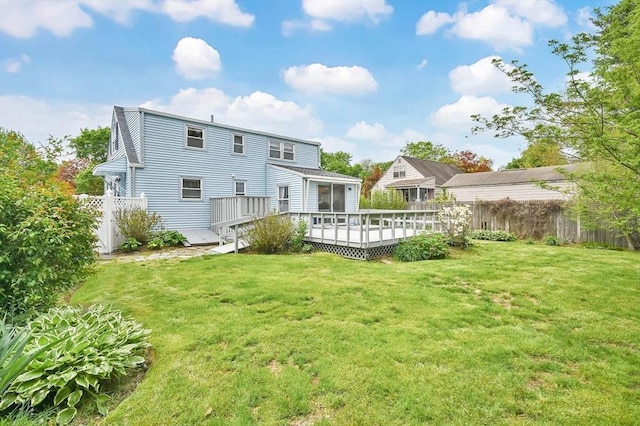 rear view of house with a deck