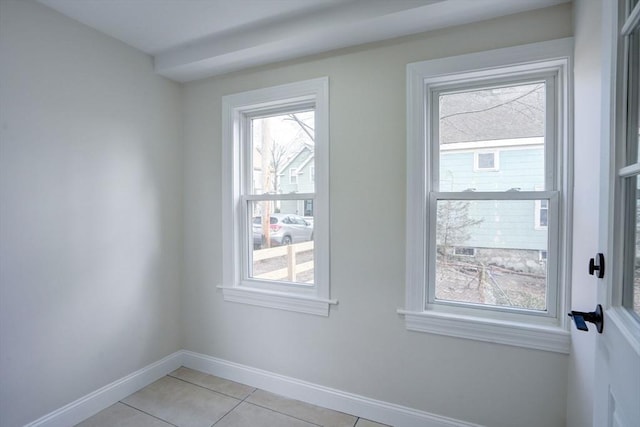 view of tiled spare room