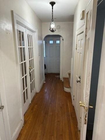 doorway to outside featuring dark hardwood / wood-style floors and french doors