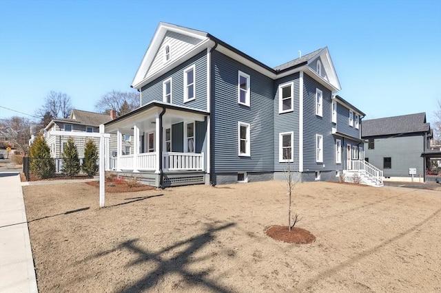 view of home's exterior with a porch