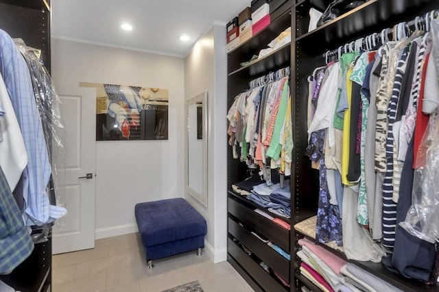 walk in closet featuring light tile patterned floors