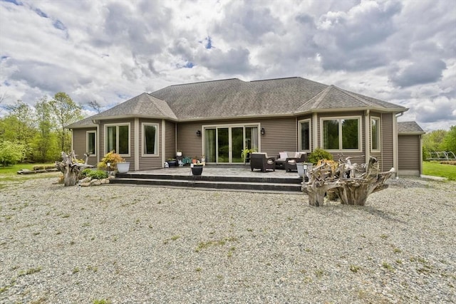 back of house with outdoor lounge area and a wooden deck