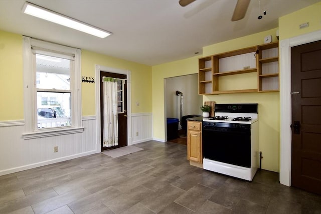 82 Worcester St, West Springfield, MA 01089 - kitchen with range with gas cooktop, a ceiling fan, a wainscoted wall, and open shelves