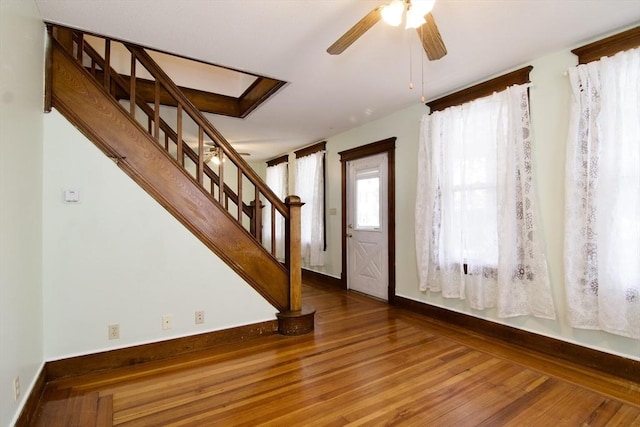 82 Worcester St, West Springfield, MA 01089 - foyer featuring wood finished floors, a ceiling fan, stairway, and baseboards
