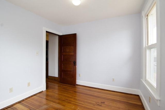 82 Worcester St, West Springfield, MA 01089 - spare room featuring wood finished floors, plenty of natural light, and baseboards