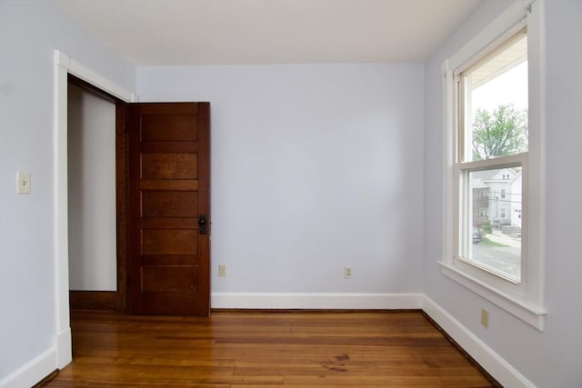 82 Worcester St, West Springfield, MA 01089 - spare room with wood finished floors, healthy amount of natural light, and baseboards