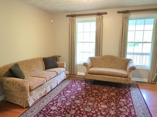 659 Sherman Farm Rd, Burrillville, RI 02830 - living room with plenty of natural light and wood finished floors