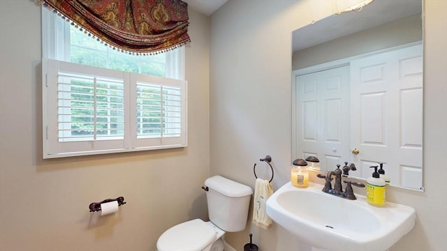 659 Sherman Farm Rd, Burrillville, RI 02830 - bathroom featuring a sink, healthy amount of natural light, and toilet