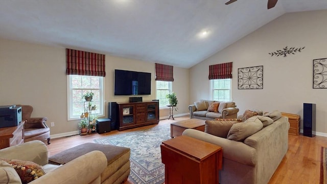 659 Sherman Farm Rd, Burrillville, RI 02830 - living room featuring a ceiling fan, light wood-style floors, baseboards, and high vaulted ceiling