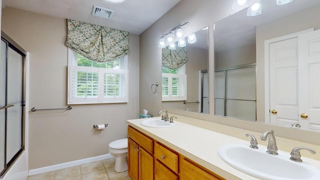 659 Sherman Farm Rd, Burrillville, RI 02830 - bathroom featuring tile patterned floors, double vanity, toilet, and baseboards