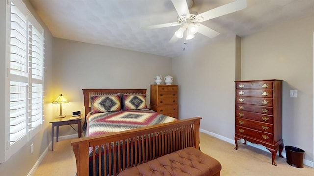 659 Sherman Farm Rd, Burrillville, RI 02830 - bedroom with multiple windows, light carpet, baseboards, and ceiling fan