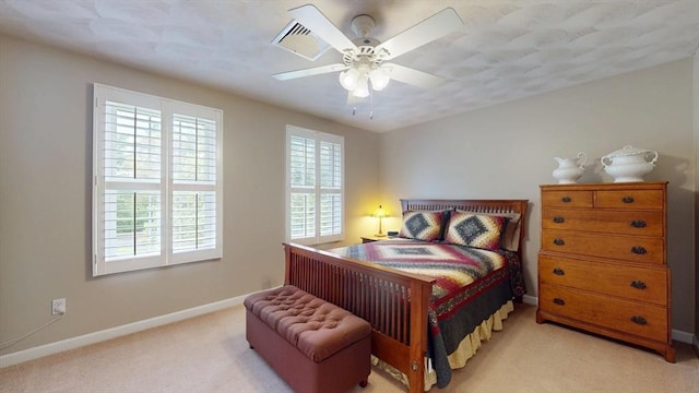 659 Sherman Farm Rd, Burrillville, RI 02830 - bedroom with light carpet, baseboards, and ceiling fan