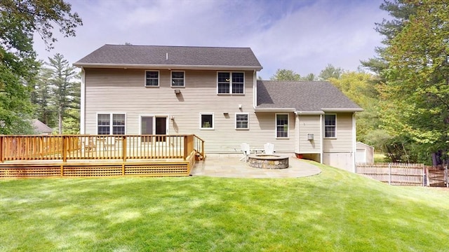 659 Sherman Farm Rd, Burrillville, RI 02830 - back of property featuring a patio, a wooden deck, a fire pit, and roof with shingles