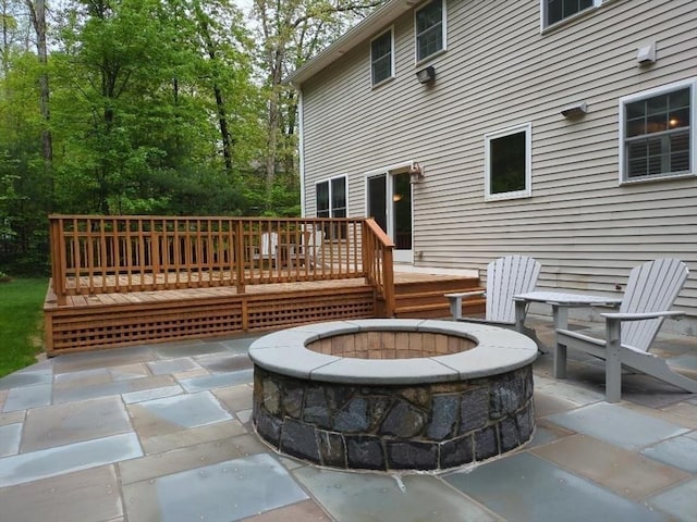 659 Sherman Farm Rd, Burrillville, RI 02830 - view of patio featuring an outdoor fire pit and a wooden deck