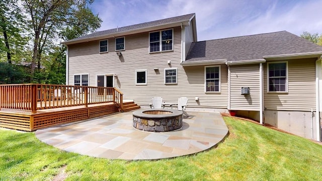 659 Sherman Farm Rd, Burrillville, RI 02830 - rear view of property featuring a patio, an outdoor fire pit, a lawn, a deck, and roof with shingles