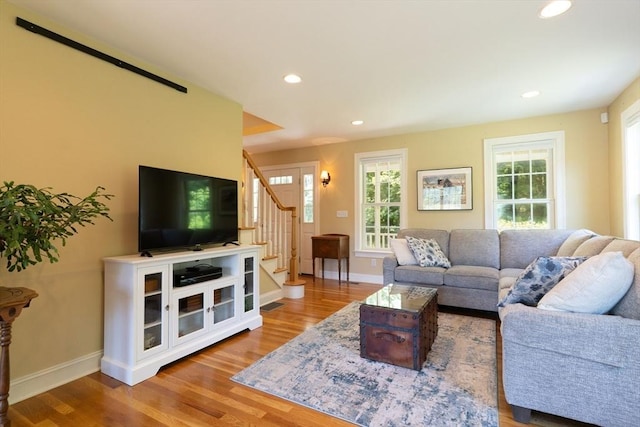 9 Old Poor Farm Rd, Ware, MA 01082 - living room with wood finished floors, recessed lighting, and stairs
