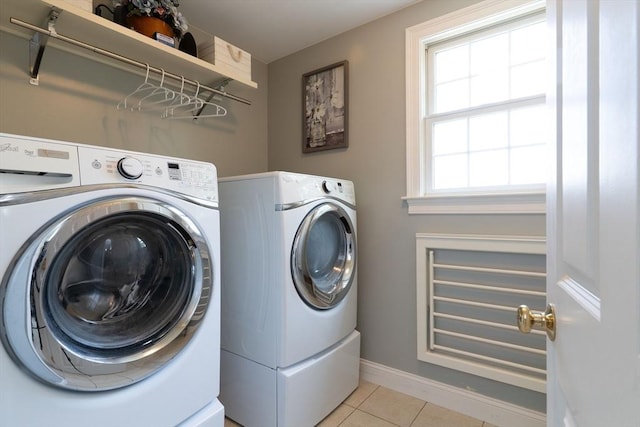 9 Old Poor Farm Rd, Ware, MA 01082 - laundry area featuring washer and dryer and light tile patterned floors