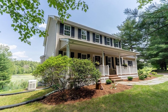 9 Old Poor Farm Rd, Ware, MA 01082 - colonial house featuring a porch and a front lawn