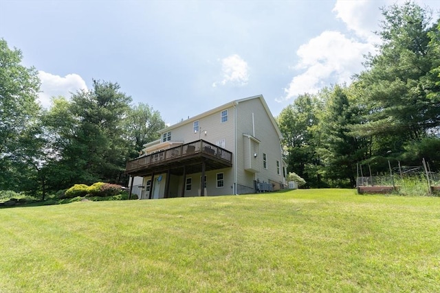 9 Old Poor Farm Rd, Ware, MA 01082 - rear view of house with a deck and a lawn