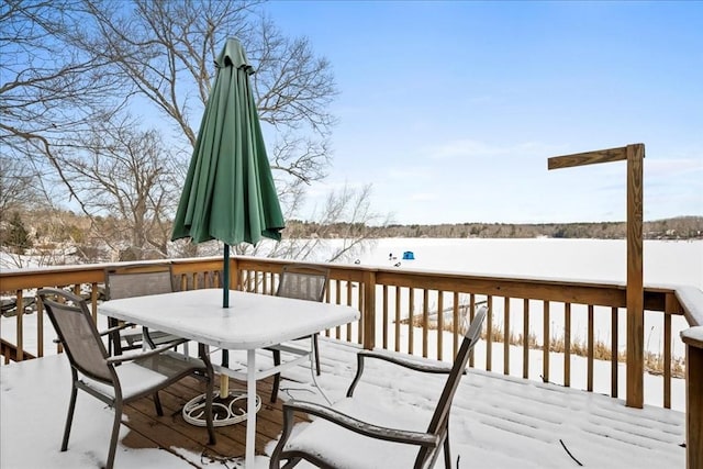 view of snow covered deck