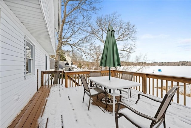 view of snow covered deck