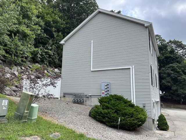 view of property exterior with a garage