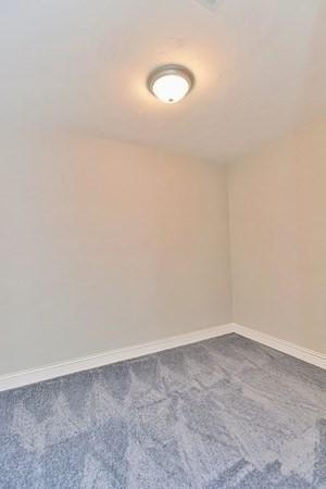 empty room with carpet floors