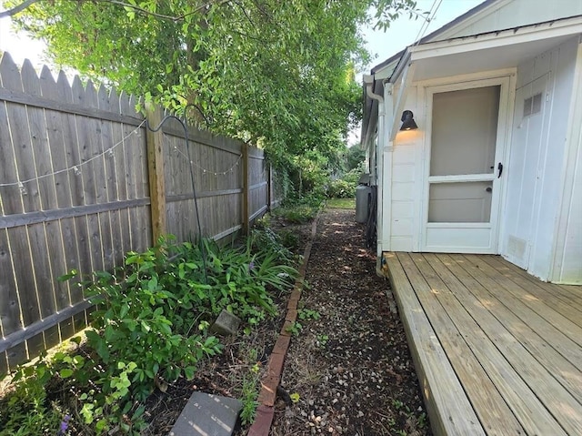 view of yard with a wooden deck