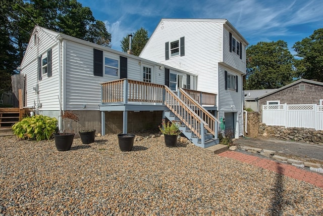 view of front of house featuring a wooden deck