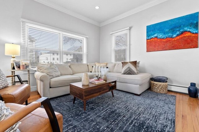 living room featuring ornamental molding, wood finished floors, recessed lighting, baseboards, and baseboard heating