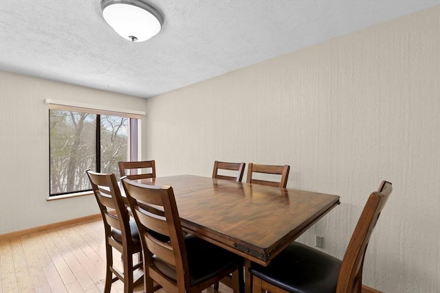 dining area featuring hardwood / wood-style floors