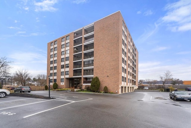 49 Melrose St Unit 4E, Melrose, MA 02176 - view of apartment building / complex featuring uncovered parking