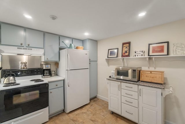 49 Melrose St Unit 4E, Melrose, MA 02176 - kitchen with extractor fan, range with electric cooktop, freestanding refrigerator, stainless steel microwave, and gray cabinetry
